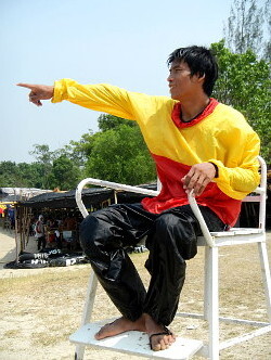 Lifeguard signals one arm up help me